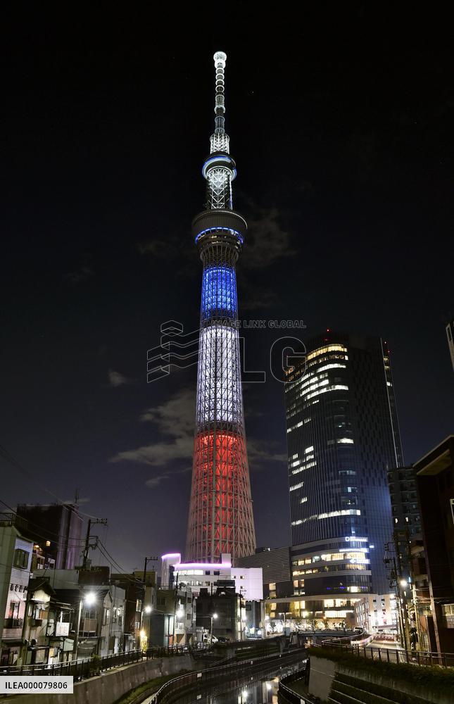 Tokyo Skytree lit up in blue, white, red in tribute to Paris victims