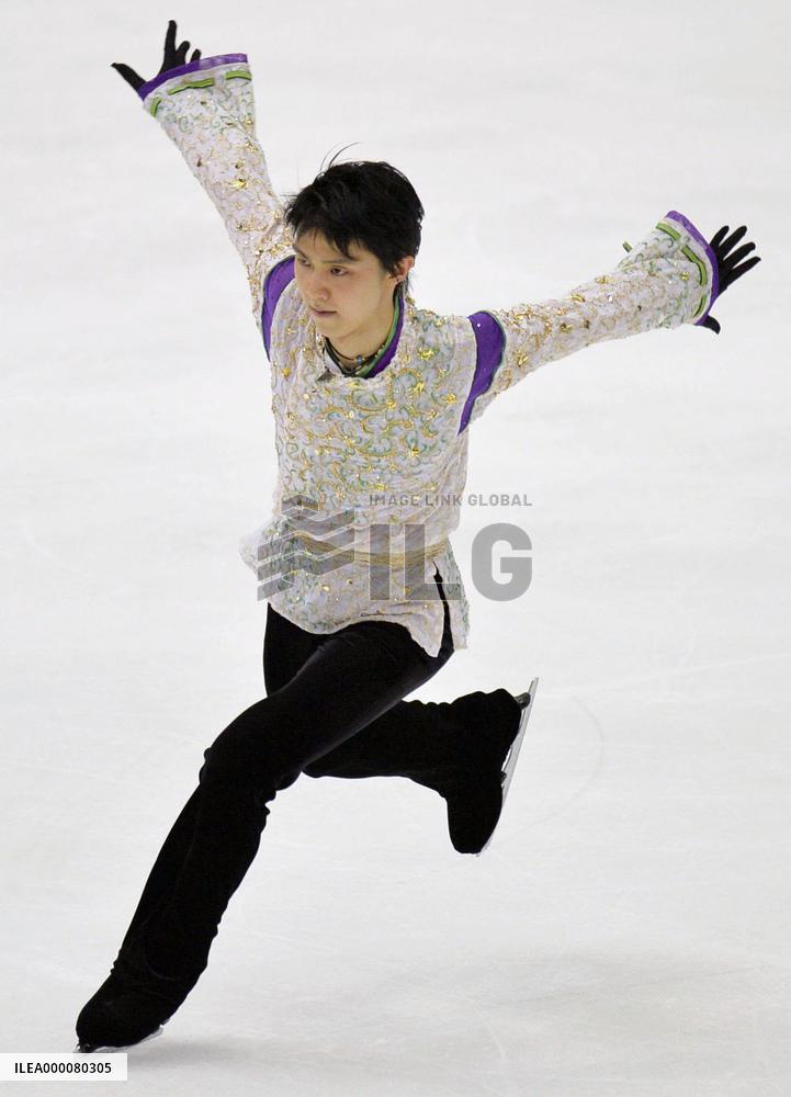 Hanyu wins NHK Trophy with record 300-plus score