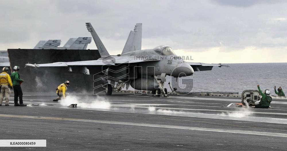 Fighter jet set to take off from U.S. flattop in naval drill