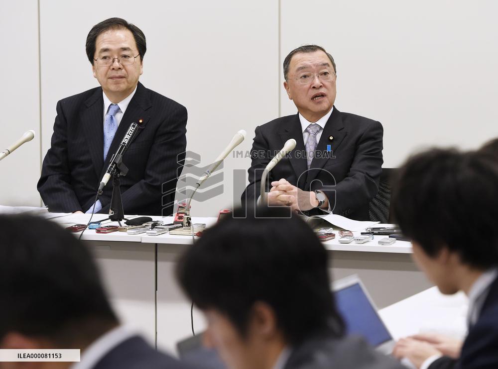 Japan's ruling bloc adopts sales tax hike exemption