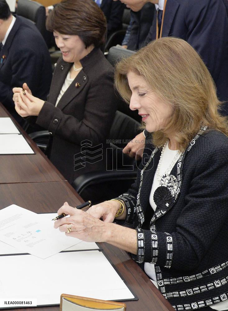 Kennedy signs bilateral agreement