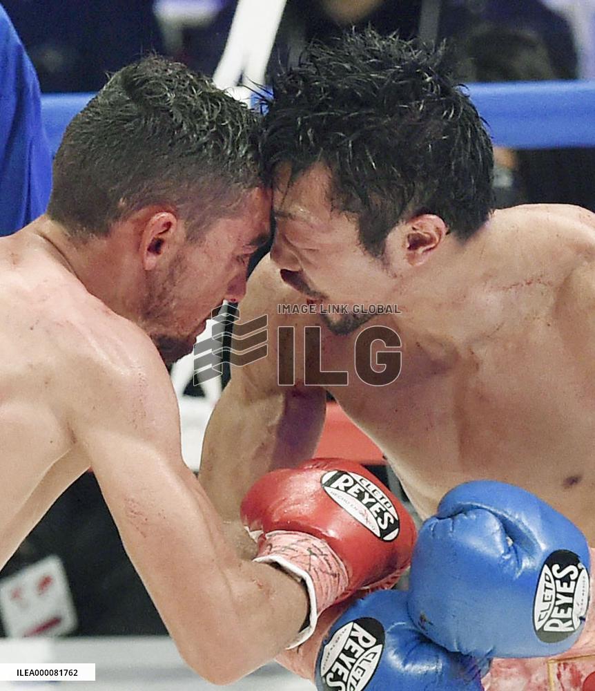 Boxing: Yaegashi grabs 3rd world title