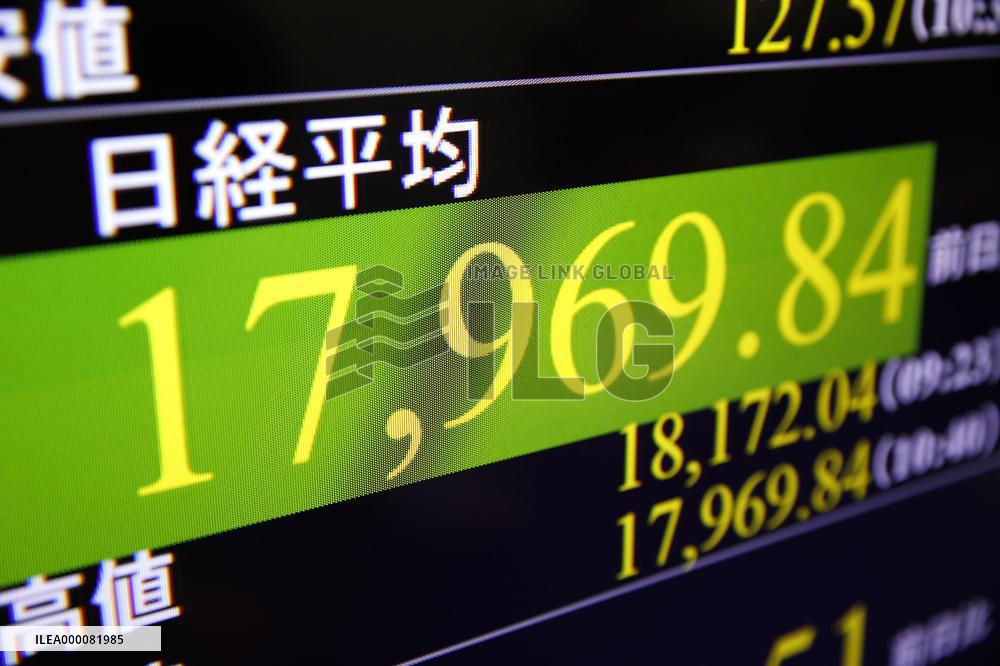 Nikkei dips below 18,000