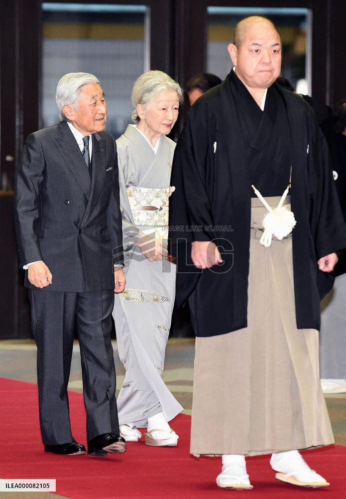 Emperor, empress watch New Year sumo tournament