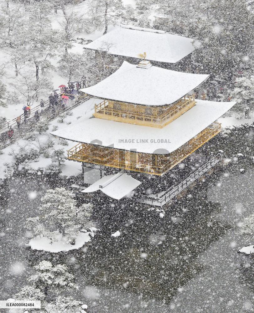 Tourist city Kyoto covered with snow