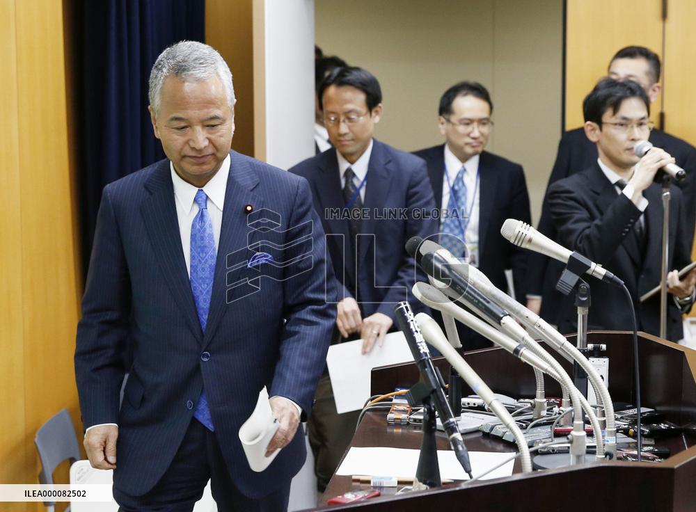 Economy minister Amari vows "accountability" over bribery allegation