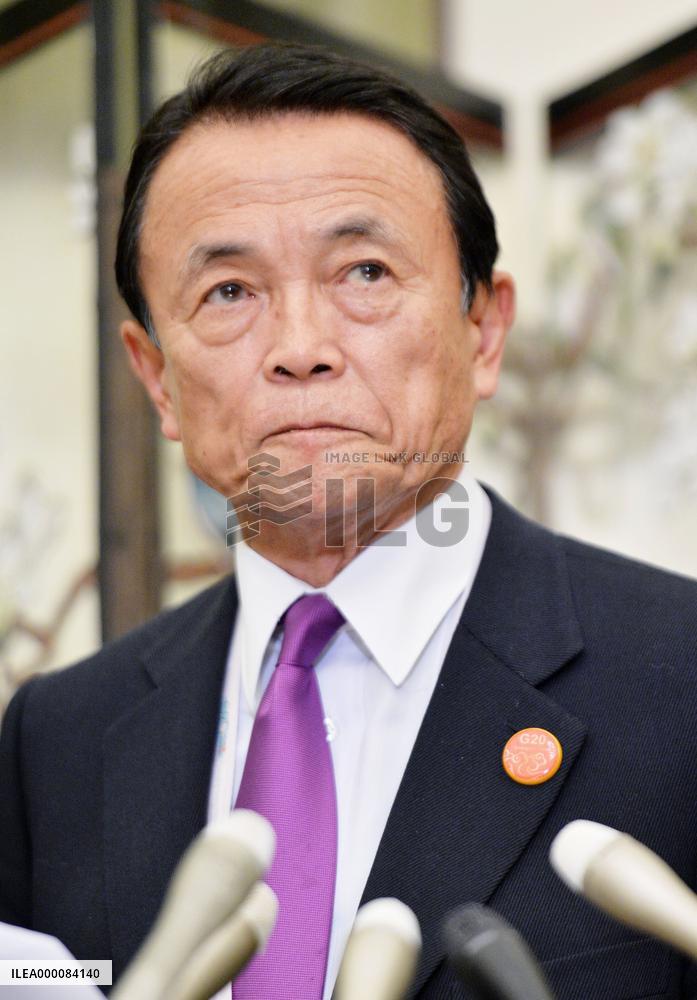 Finance Minister Aso meets with reporters