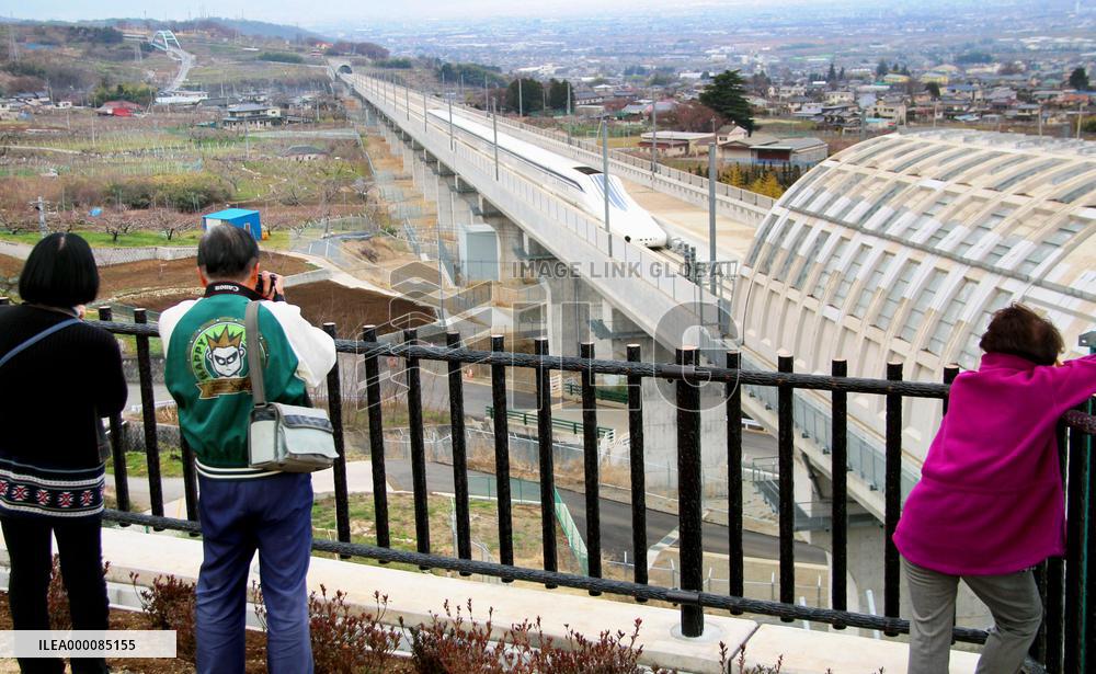 People view maglev train from new observation deck