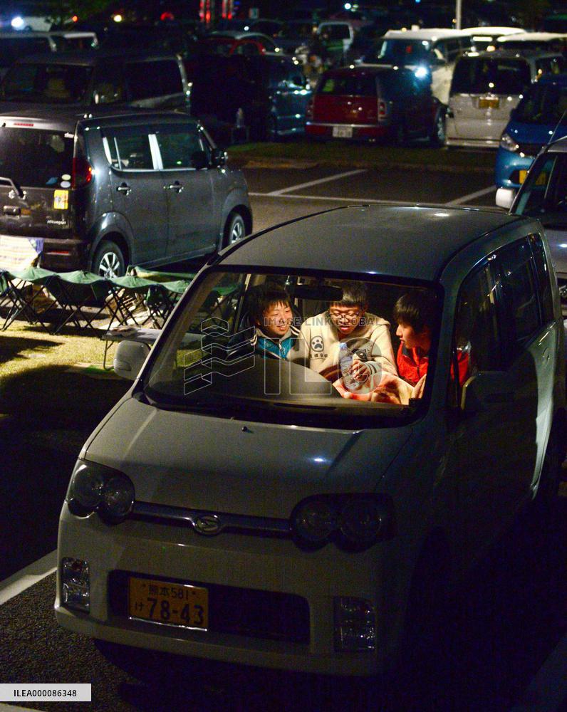 Evacuees fight exhaustion in southwestern Japan quakes