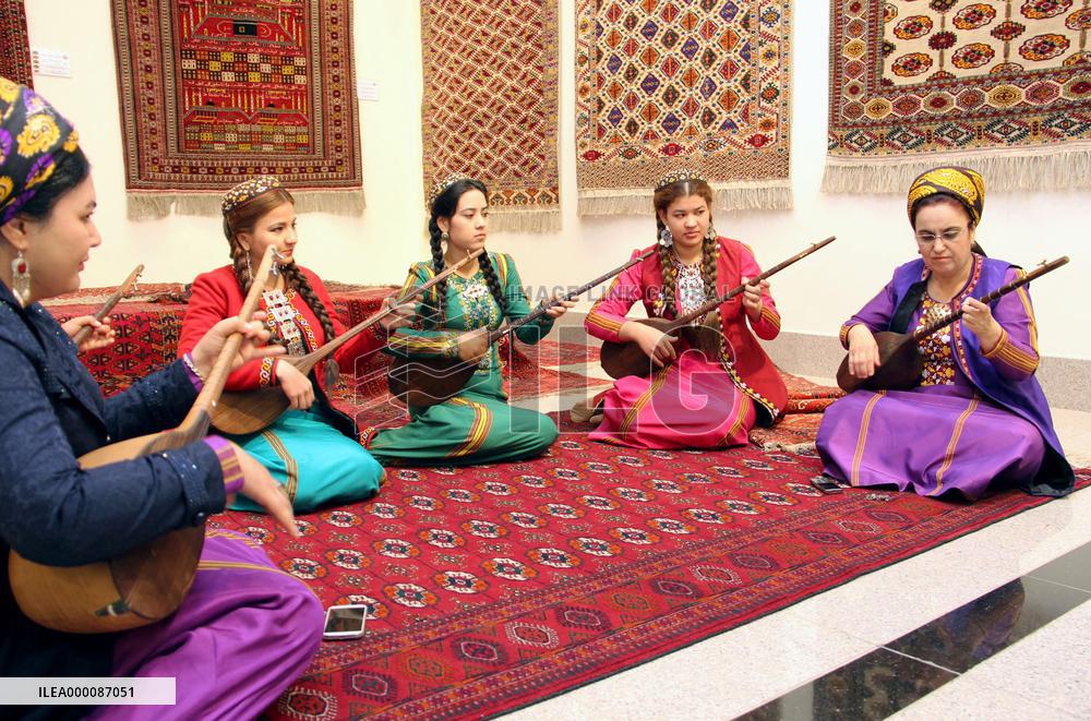 Turkmen women perform music at carpet museum