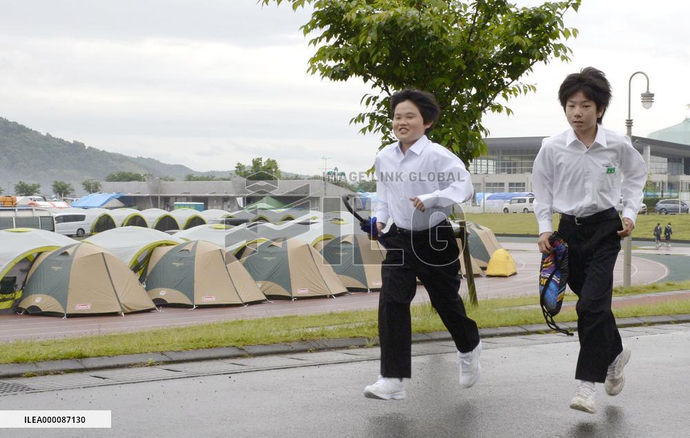 Schools in quake-hit areas reopen