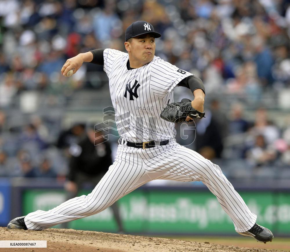 Tanaka gets no-decision in Yankees' win