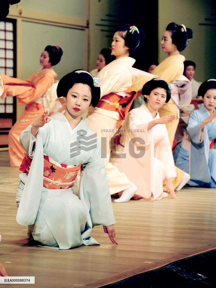 Geisha rehearse traditional dance performance