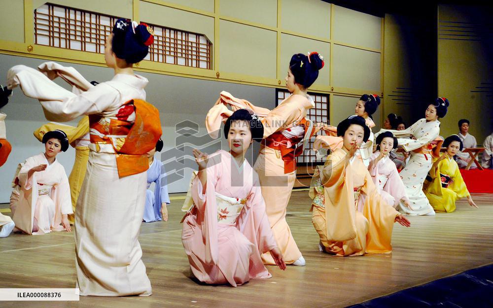 Geisha rehearse traditional dance performance