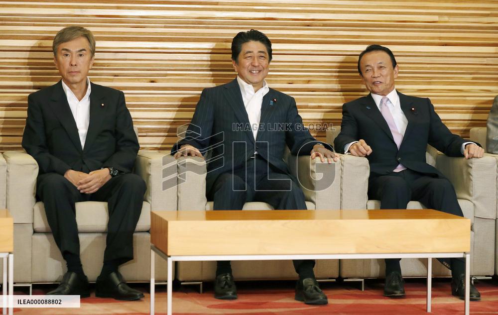 Japan to "respond steadily" to stem yen's rapid moves: Aso