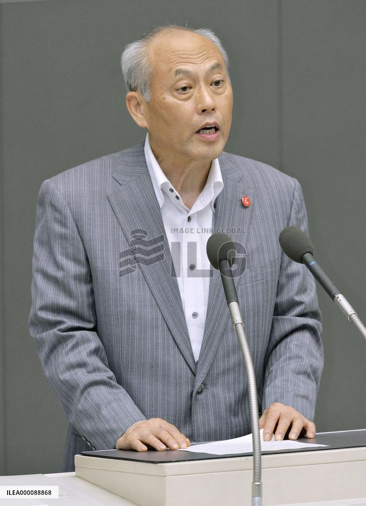 Tokyo governor steps down over political funds scandal