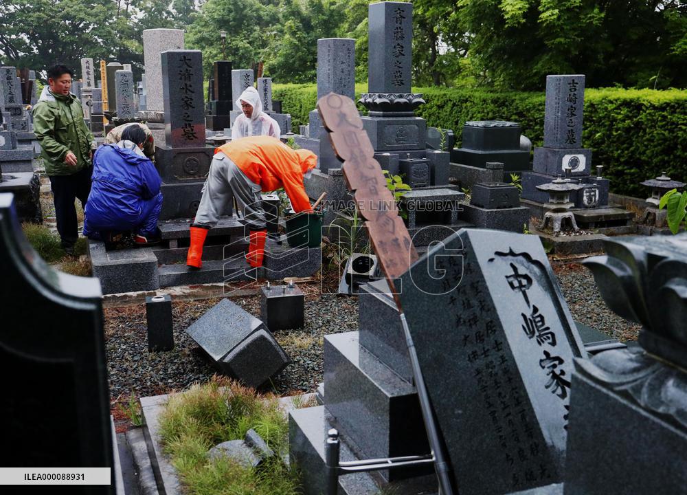 Gravestones damaged by powerful quake in Hokkaido