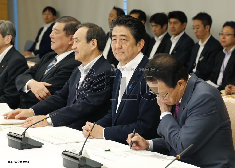 Japan retains economic assessment despite corporate profit downgrade