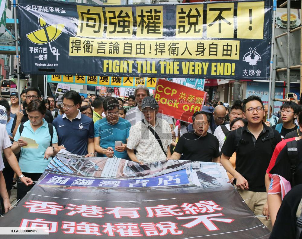 Thousands march in Hong Kong over booksellers' disappearance