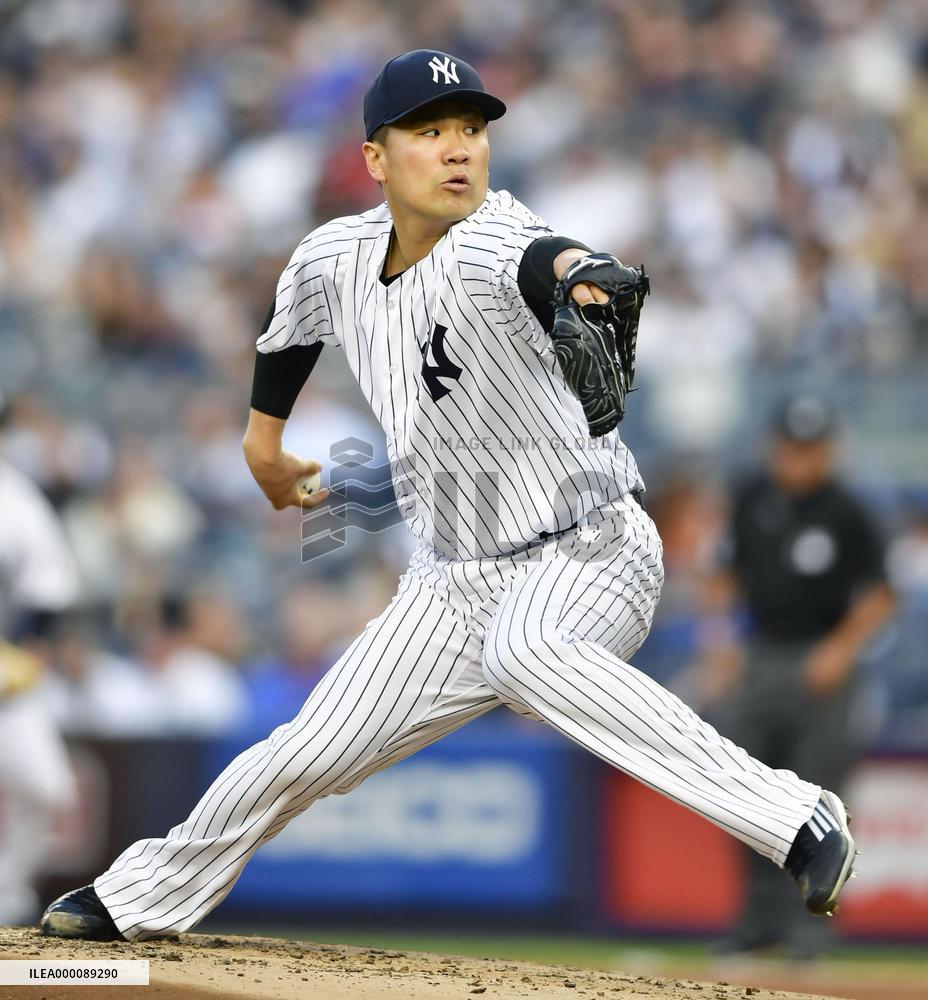 Tanaka gets 5th win as Yankees beat Twins