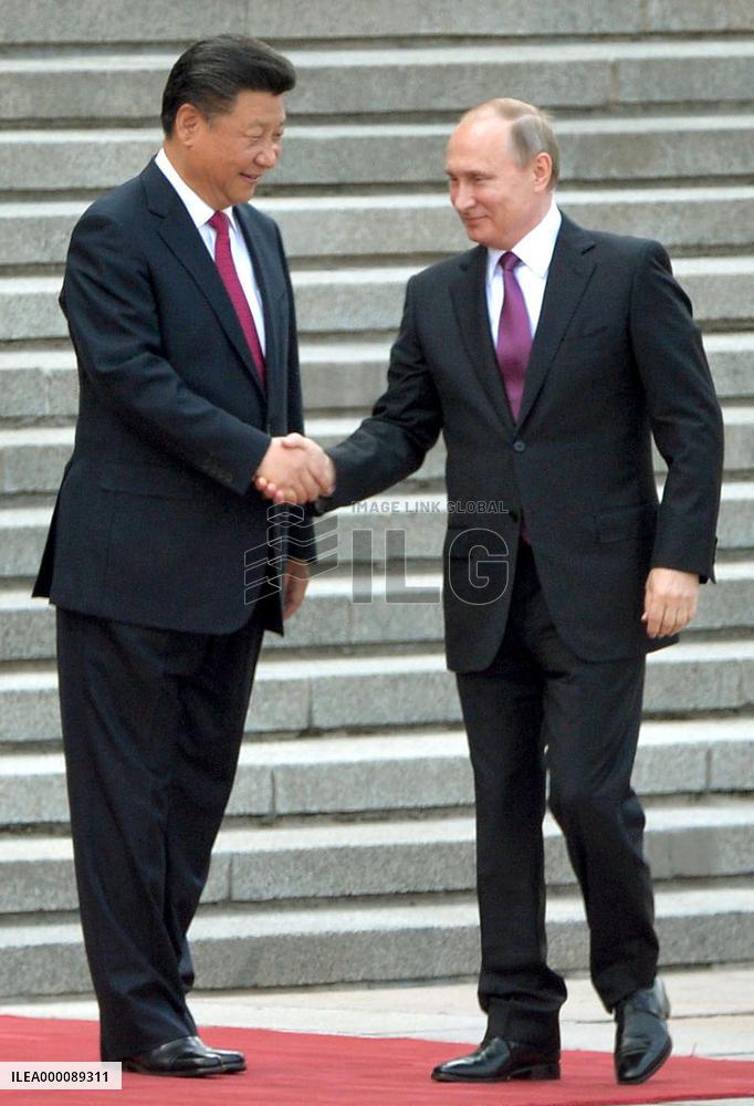 Xi welcomes Putin in Beijing