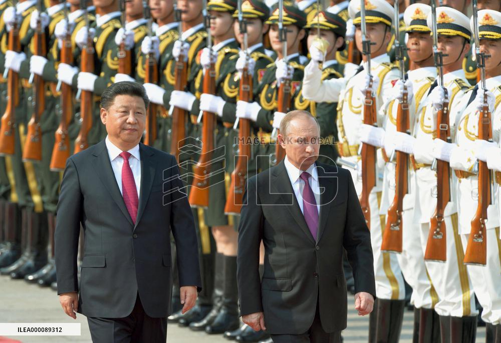 Xi welcomes Putin in Beijing