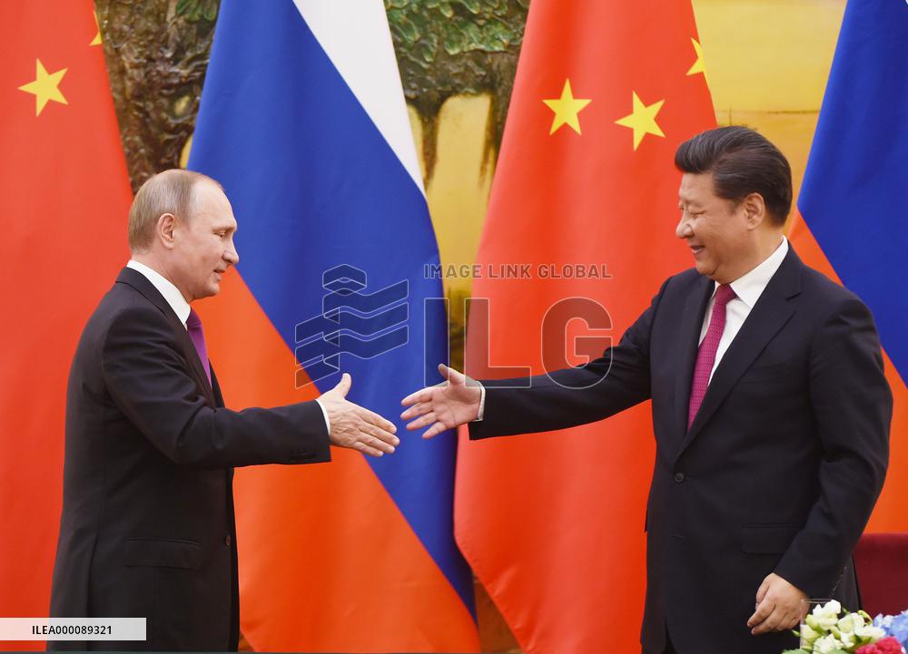 Xi welcomes Putin in Beijing