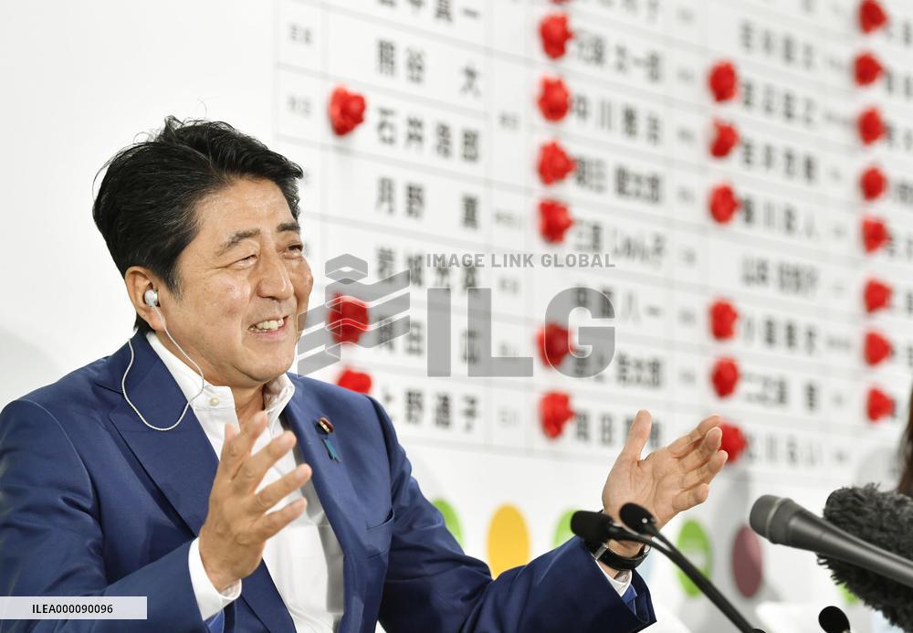 Japan's ruling bloc to win majority of contested upper house seats