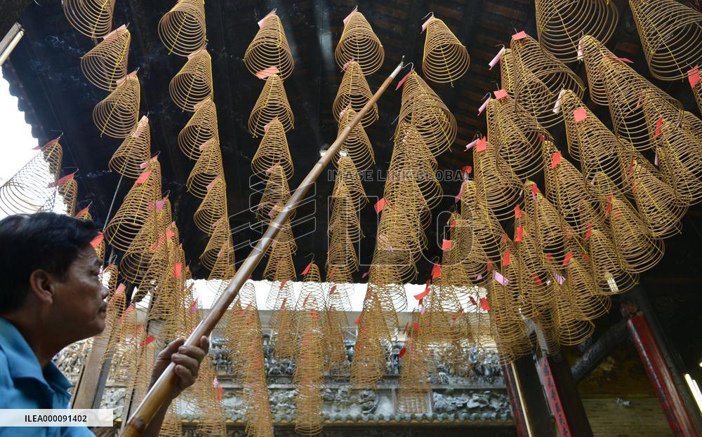 Spiral-shaped incense at temple in Vietnam