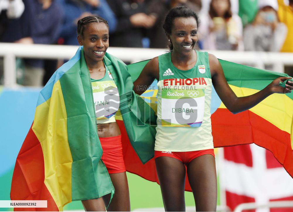 Ethiopia's Ayana wins women's 10,000-meter gold with world record