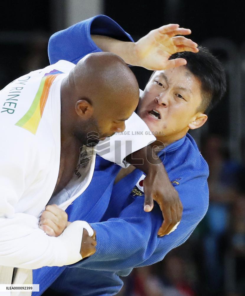Olympics: Riner wins judo over 100-kg gold