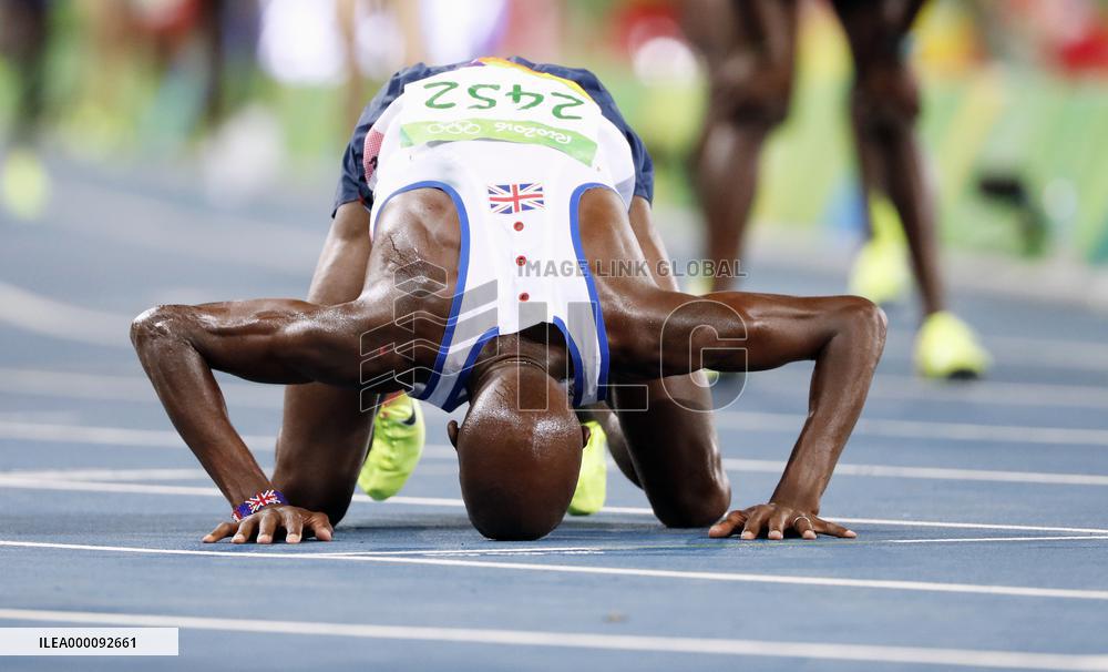 Olympics: Farah wins men's 10,000