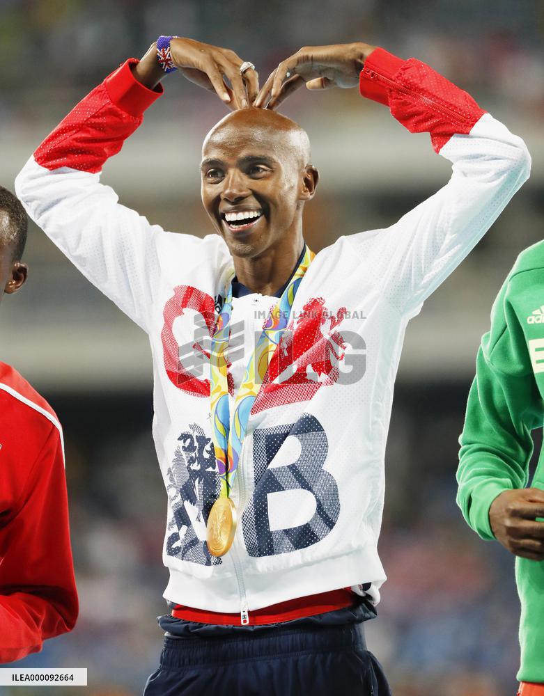 Olympics: Farah wins men's 10,000