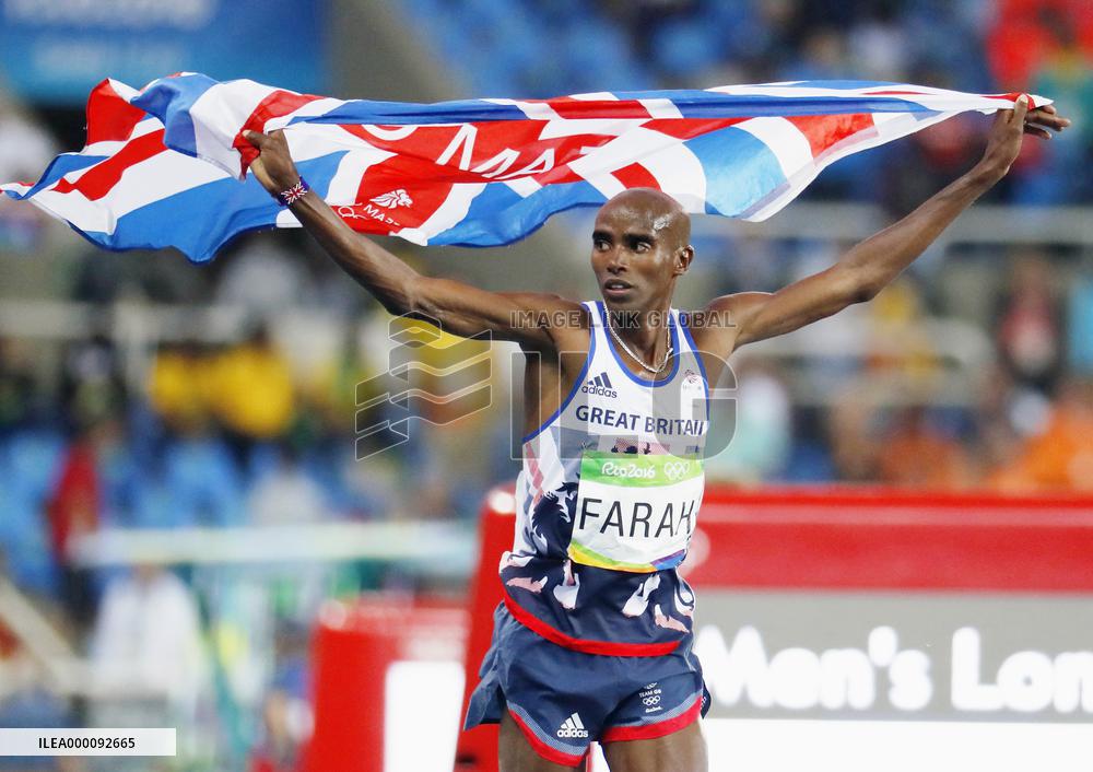 Olympics: Farah wins men's 10,000