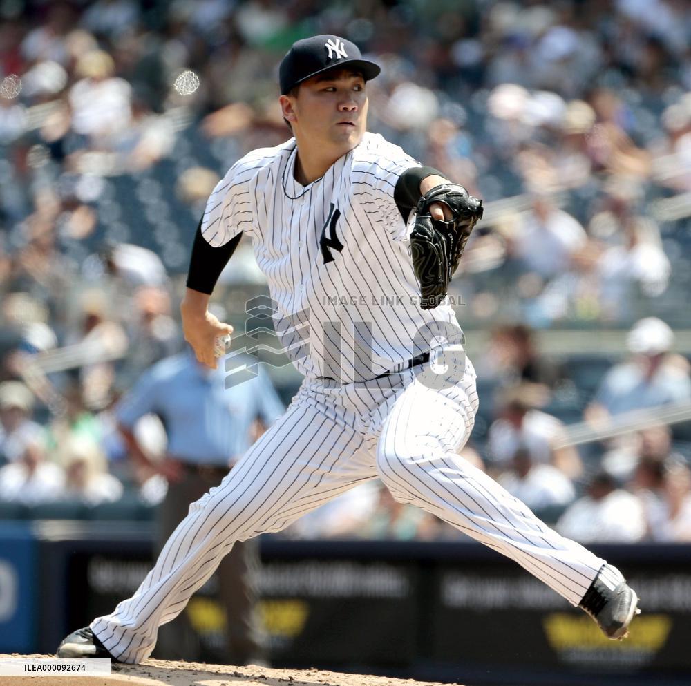 Tanaka earns 9th win as Yankees outslug Rays