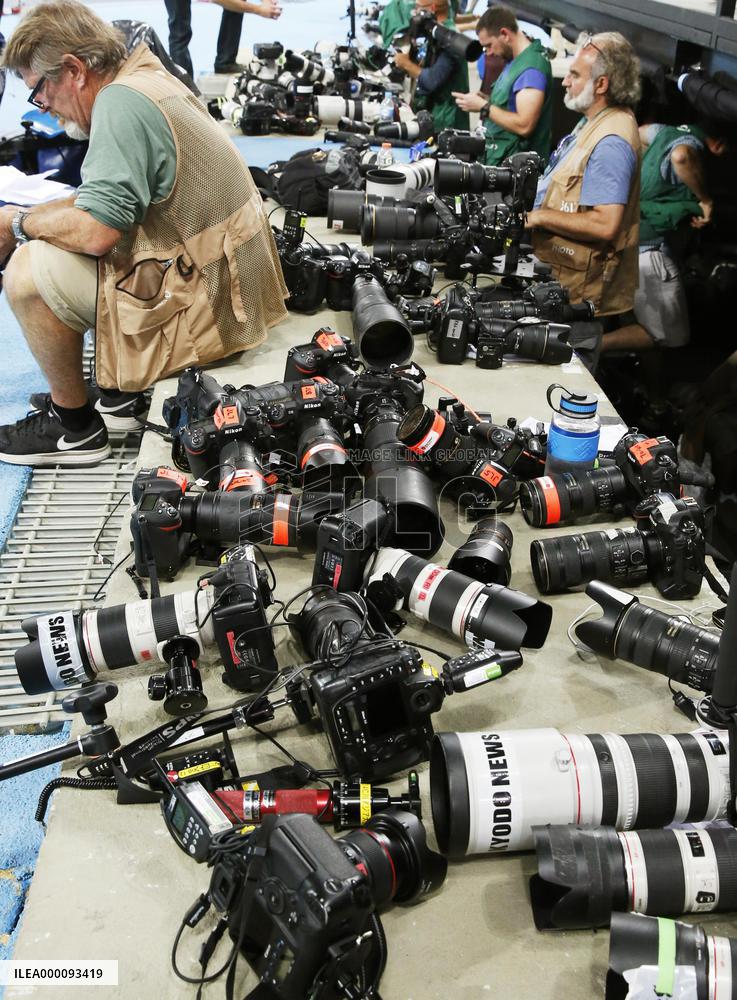 Olympic scenes: Cameras after Bolt's gold in 100 meters