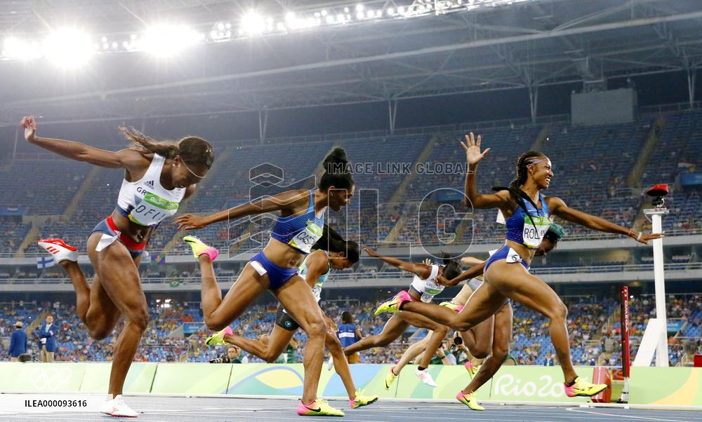 Olympics: Rollins leaps to gold in women's 100m hurdles