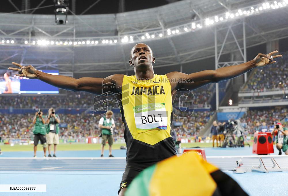 Olympics: Bolt celebrates 200m gold