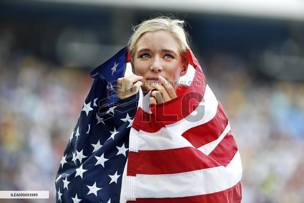Olympic scenes: Bronze medalist wrapped with flag