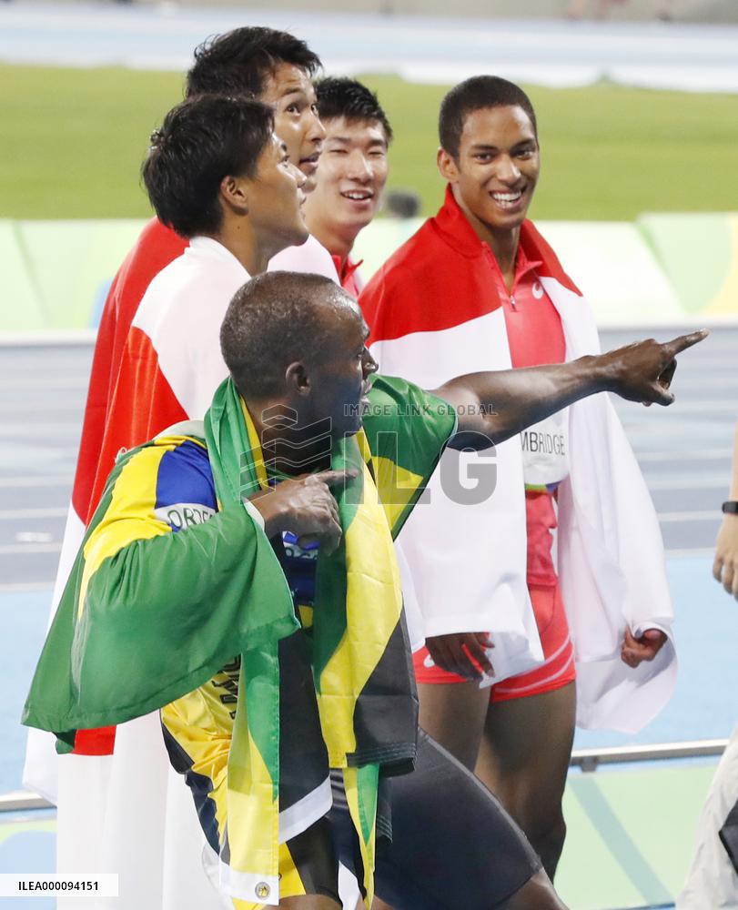 Olympics: Bolt, Japanese relay team in celebration
