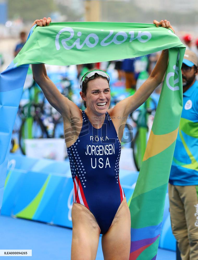 Olympics: Jorgensen claims triathlon gold