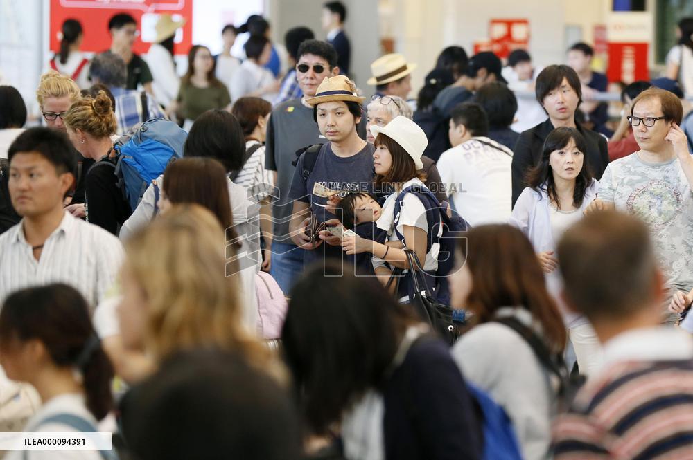 Holidaymakers return home