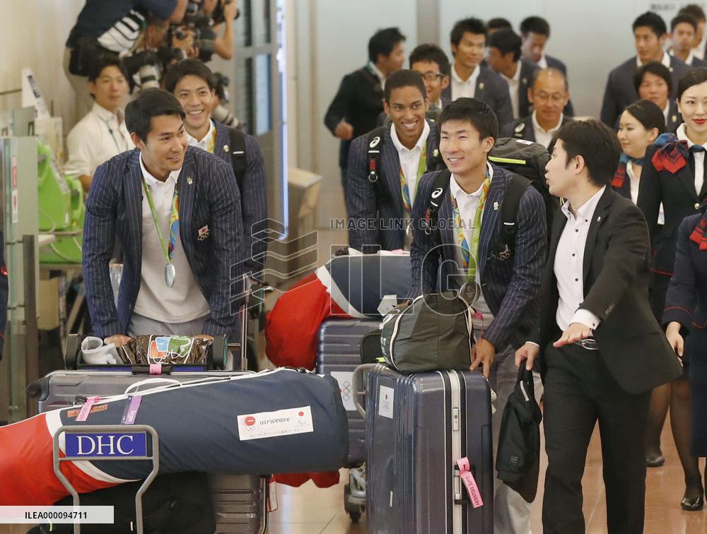 Japanese athletes return from Rio
