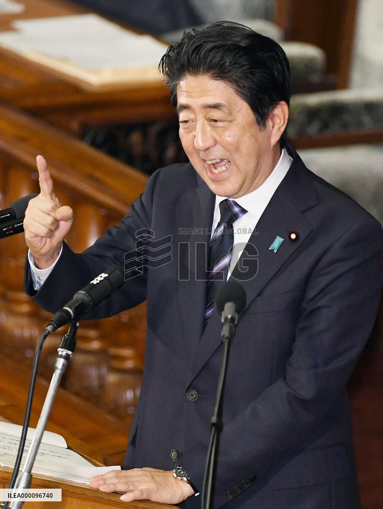 Japan PM Abe vows action on trade deal, economy as Diet session opens