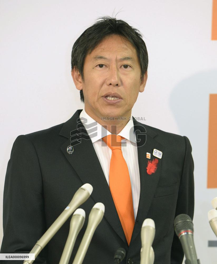 Sports agency chief Suzuki at press conference