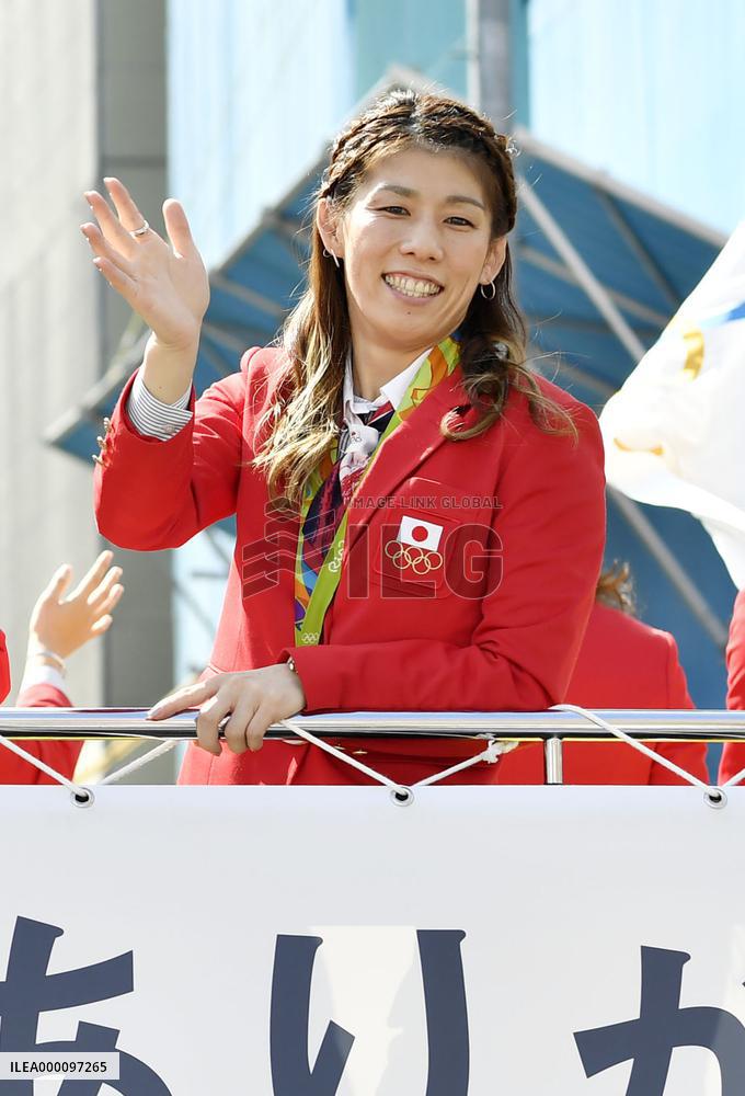 Olympics, Paralympics medalists parade through Tokyo