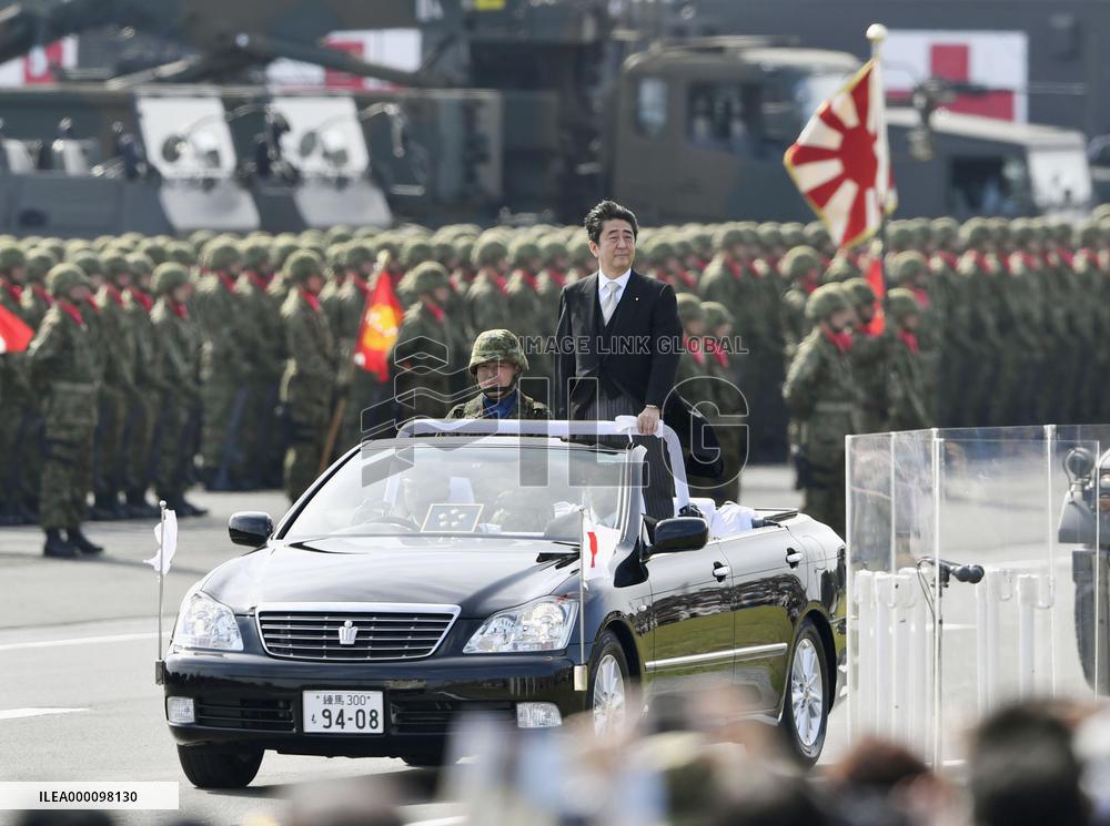 Japan PM pitches SDF's new overseas duties at review ceremony