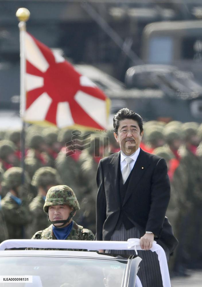 Japan PM pitches SDF's new overseas duties at review ceremony