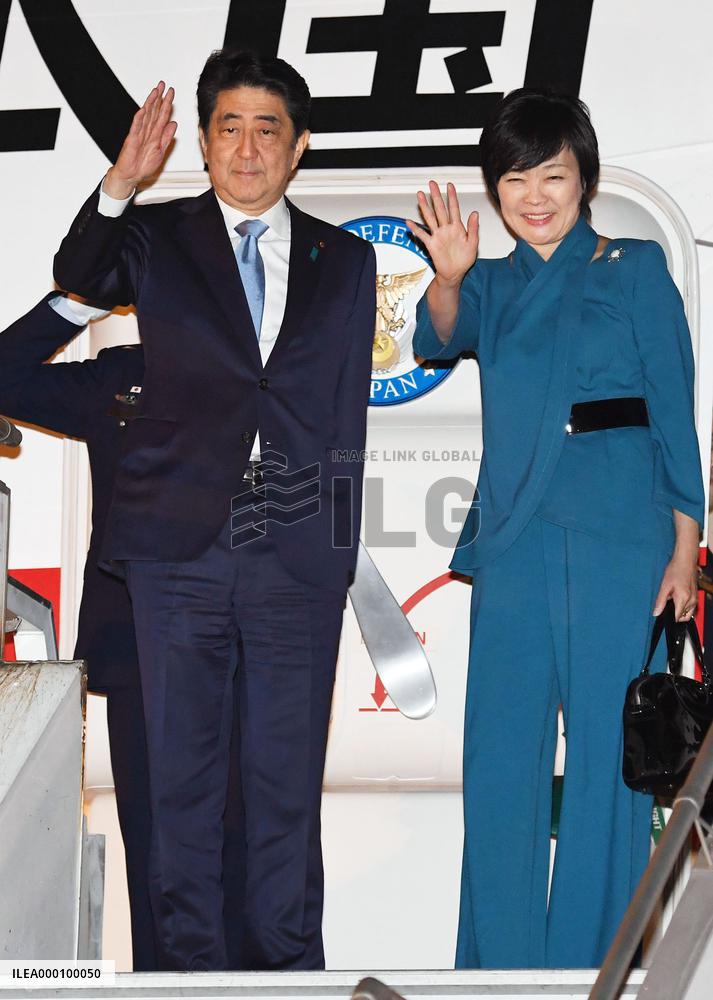 Abe heads home after 7-day trip overseas