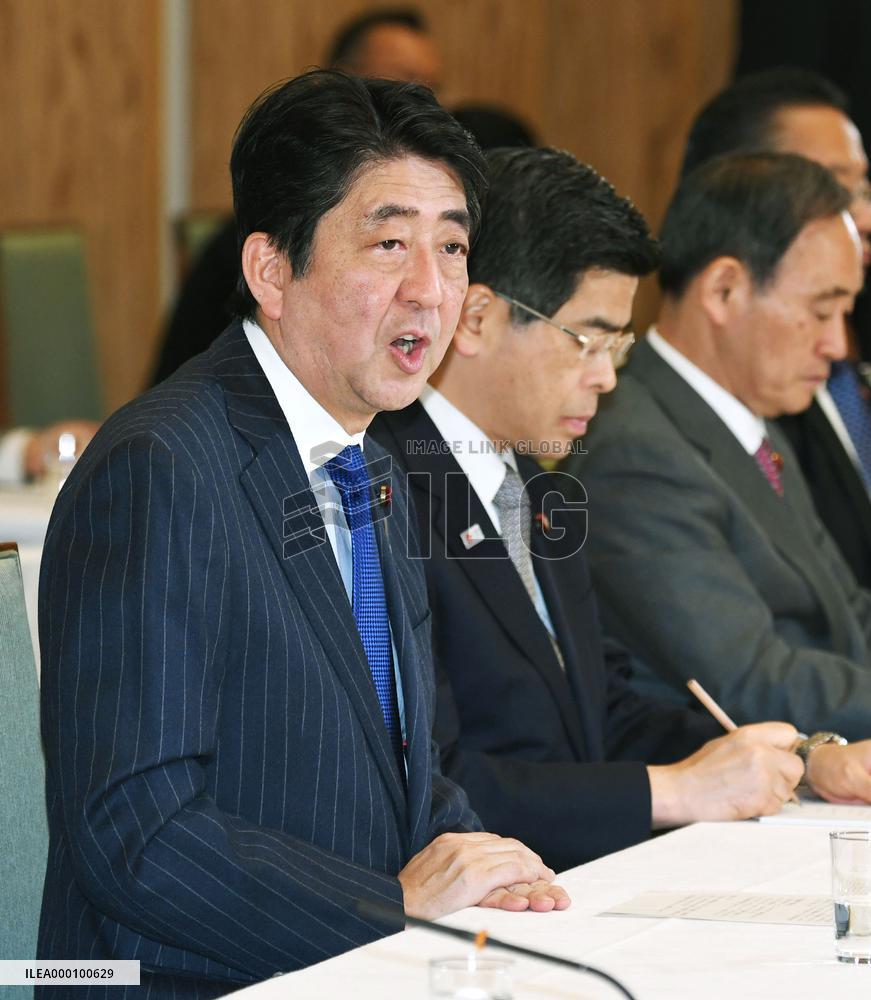 Abe vows to move treaty talks forward with Putin despite difficulty
